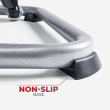 Non-slip rubber base of a mini exercise stepper in dark gray