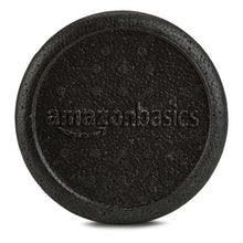Black foam roller end cap with embossed grip texture and logo