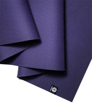 Manduka X yoga mat, purple layered edges with corner symbol