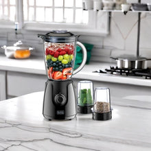 Black+Decker 400W blender with clear glass jar of fruit and two grinding mill cups