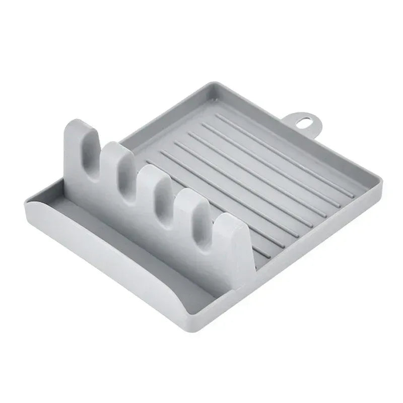 Gray plastic utensil rest organizer tray with four utensil slots and hanging loop