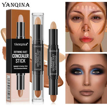 Concealer and contour stick, beige tip in black cap, shown with product boxes