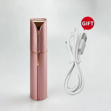 Rose gold mini face epilator shaver with USB charging cable.