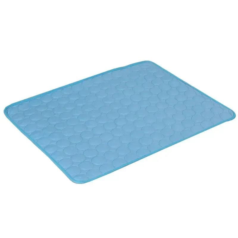 Blue cooling mat with raised hex pattern and rounded corners