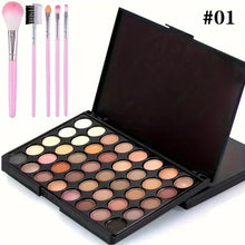 Glitter eyeshadow palette open black case with color pans and 5 brushes