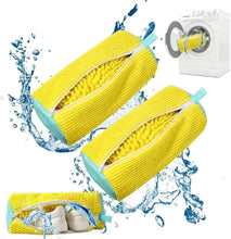 Two yellow shoe washing bags with light-blue trim and zipper, with water splashes