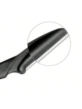 Eyebrow trimmer blade close-up, black handle with silver comb edge