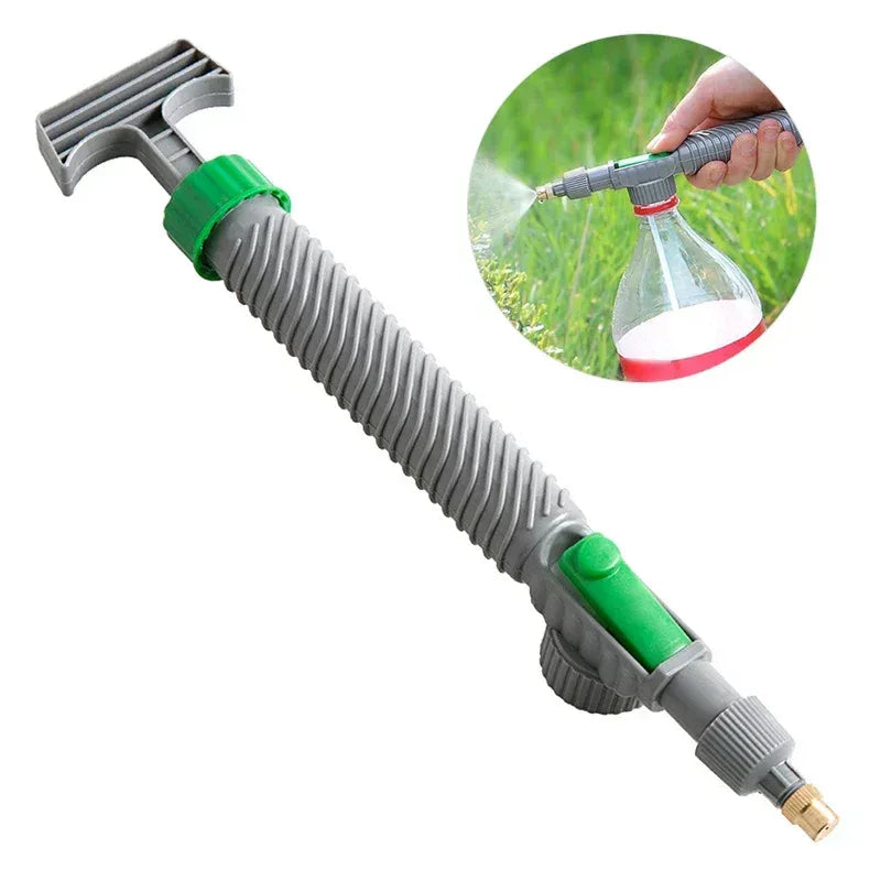 Manual bottle sprayer nozzle with green valve, ribbed grey hose, brass spray tip