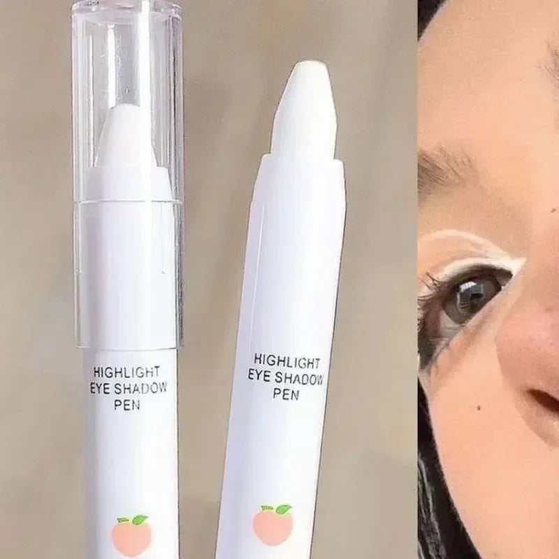 Highlight eyeshadow pen with clear cap and applied shimmer on under-eye area