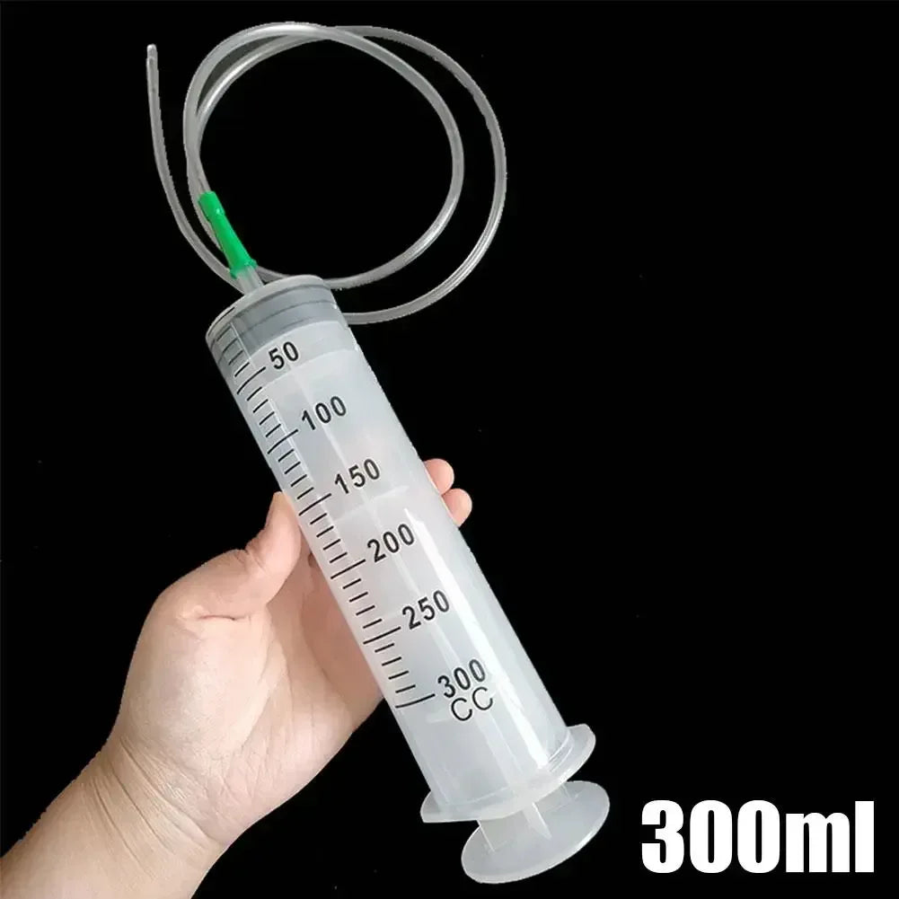 300ml vacuum syringe oil pump with needle tip, measurement barrel, and clear hose