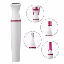 Hair removal trimmer with black grooming head and red guard, white with pink tips