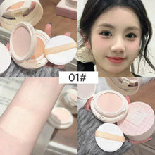 Double-layer powder cushion compact with pink lid and beige powder insert, with swatch and model