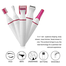 Multi-head hair trimmer set with white handles and pink comb and grooming attachments