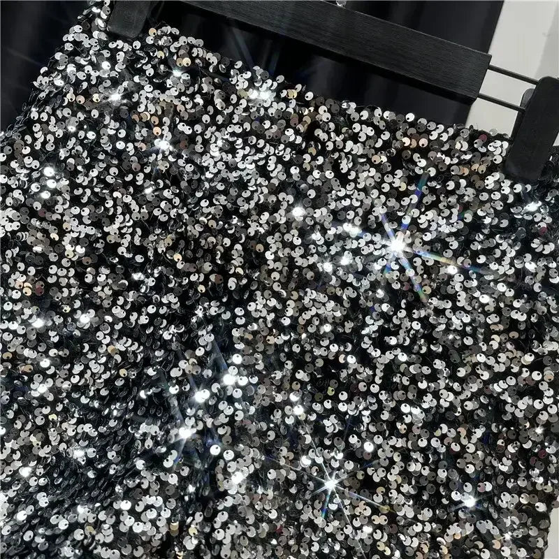 Black sequined shorts with dense silver sequins and high-shine front surface