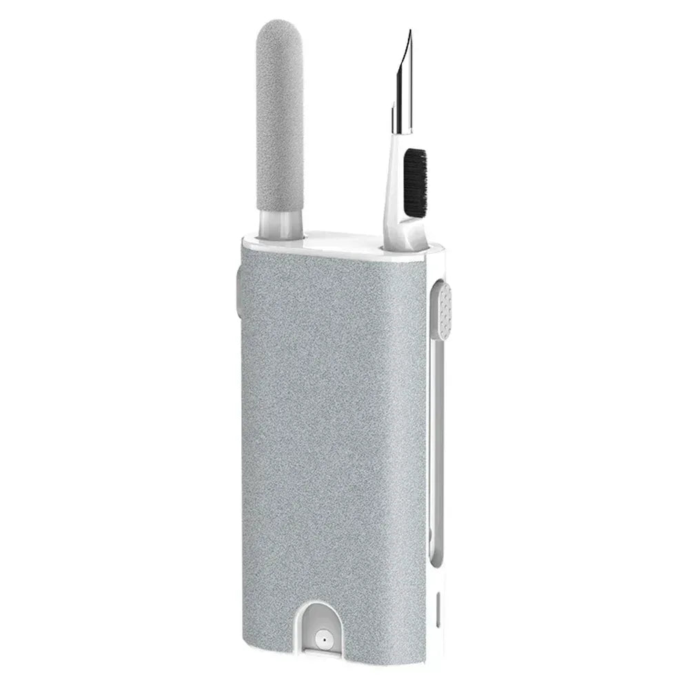 Earphone cleaner brush kit with gray holder, bristle brush tip, and pen-style tool