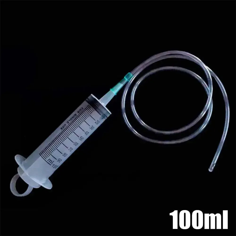 100ml reusable vacuum syringe with clear barrel, blue tube tip, and coiled clear hose
