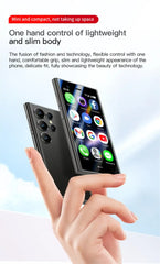 Hand holding SOYES S24 Pro Max mini smartphone slim black device with app icons on screen and multiple rear cameras