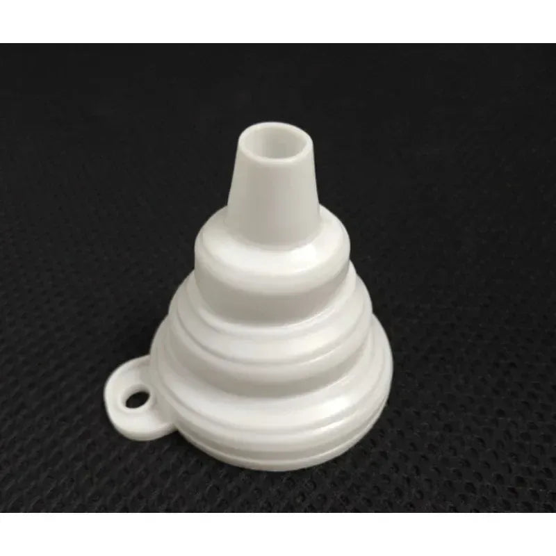 White silicone liquid funnel with ribbed collapsible design and side hang loop