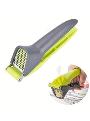 1 garlic press, a tool for crushing and squeezing garlic, a small household outdoor kitchen tool