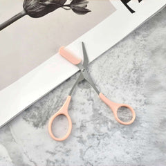 Pink eyebrow trimming scissors with built-in comb - stainless steel, precise grooming tool, creating perfect eyebrows