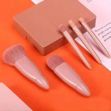 Mini makeup brush set with case, pink bristles and rose-beige handles