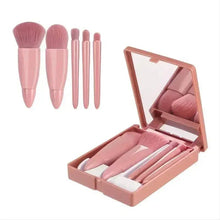 Five-piece mini makeup brush set with rose-beige handles and open compact case