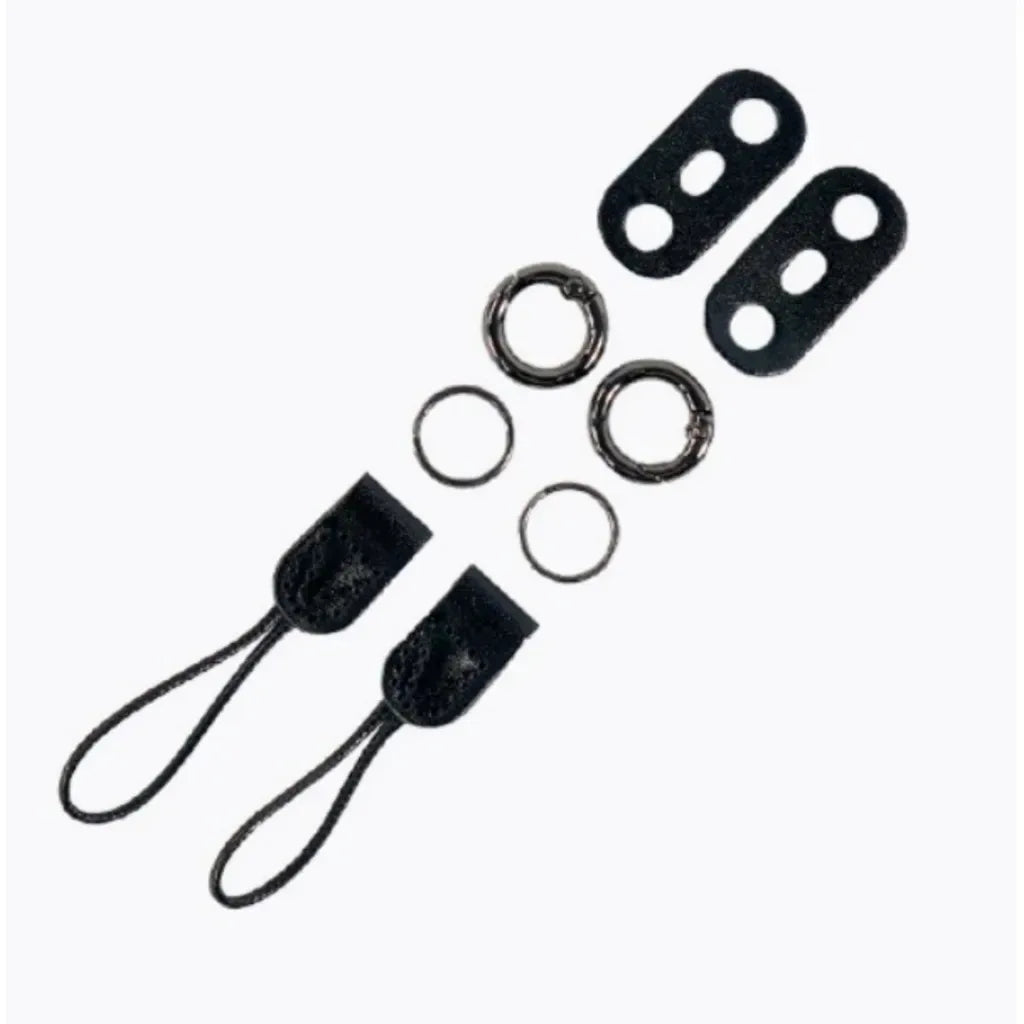 Camera strap hardware kit with black ends, metal clips, rings, and screws