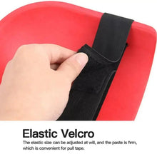 Red knee protection pad with black elastic strap and Velcro closure