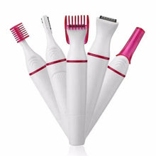 Women’s multi-head hair trimmer with red and white comb attachments