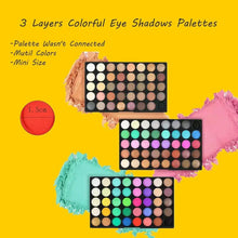 Mini eyeshadow palettes with rows of round shades in multiple color groups