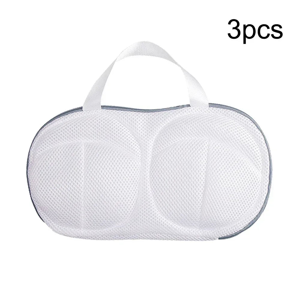 Bra laundry bag: white mesh double cups with dark trim edge and top handle