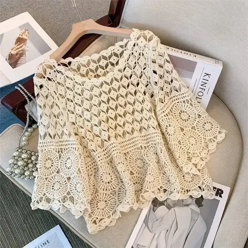 White crochet lace half-sleeve top with diamond openwork and scalloped hem