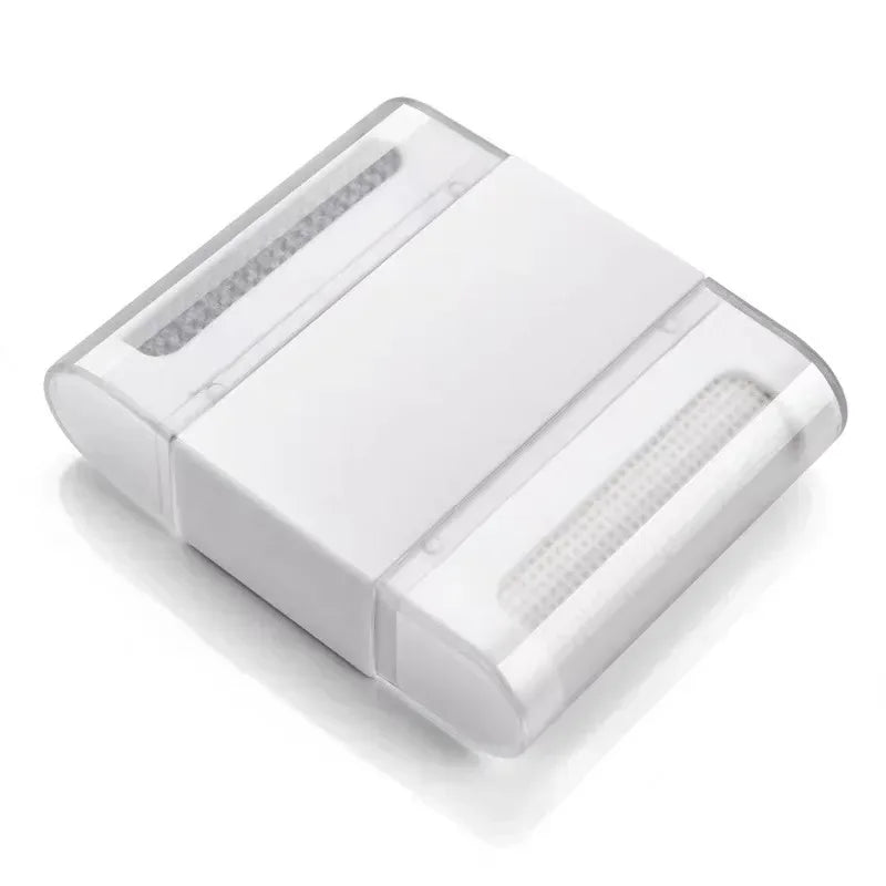 Mini lint roller brush with clear plastic cover and white roller core