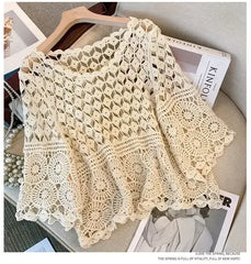 Off-white crochet lace top with wide half sleeves and circular lace motifs
