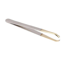 Two-tone slant-tip tweezer with gold handle and silver jaws