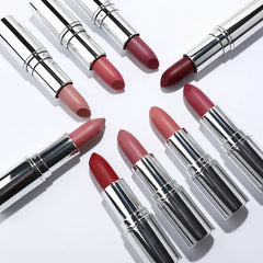 Set of Langmanni lipsticks in various shades on a white background