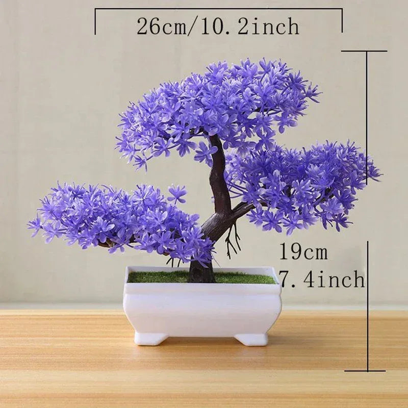 Artificial purple bonsai tree with dark brown trunk in a white rectangular pot.