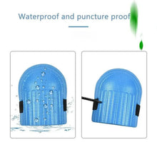 Blue knee pad with black side straps and water droplets, rounded cap.
