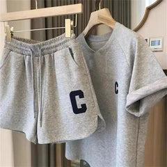 طقم نسائي صيفي فضفاض بأكمام قصيرة من قطعتين، تي شيرت، شورت كاجوال، بدلة كاجوال بطباعة رياضية، بيجامة قصيرة بمقاس كبير