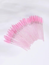 Disposable eyelash mascara wands with pink bristle spoolers