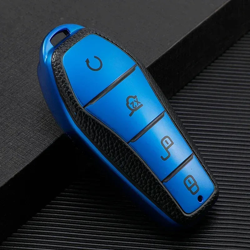 TPU 4-button car key fob case with blue panel, black trim, and 4 icon buttons.
