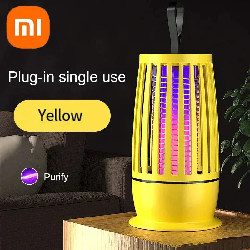 Yellow electric mosquito trap lamp with hanging handle and purple light grid