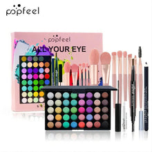 Eyeshadow palette with multicolor pans plus eye brushes, liner pencil, and mascara.