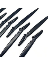 Eyebrow trimmer set with multiple black handles and silver blade heads
