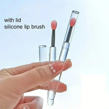 Silicone lip brush set with lids and red oval applicator tips on clear holders