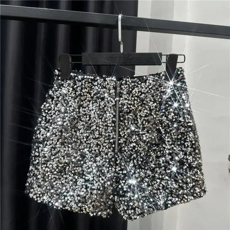 Silver sequined shorts with front zip and all-over metallic sparkle