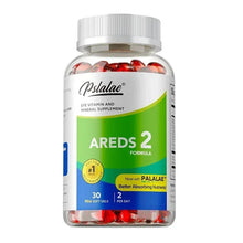 Eye vitamin and mineral supplement bottle with white cap and red softgels inside