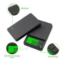 Digital pocket scale with green backlit LCD, dark platform and protective lid