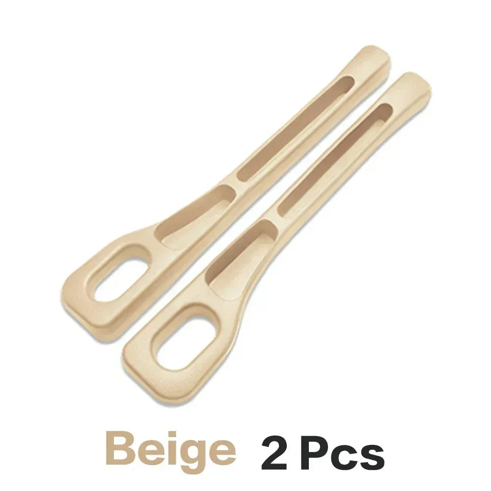 Beige 2-piece car seat gap stopper strips with oval openings, pair set.