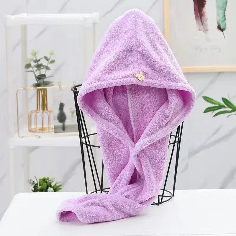 Lavender microfiber hair drying towel cap with bear emblem, hooded turban shape and long tail.